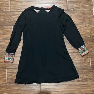 Black dress with sequin detailed cuffs size small.